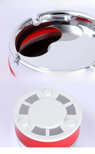 Detail view of rotating metal lid and anti-slip base of the stainless steel ashtray