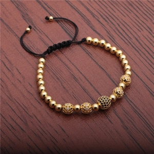 Adjustable woven bracelet with gold beads and micro-pave black zircon balls