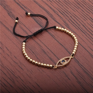 Verstellbares schwarzes Evil Eye Armband mit Goldperlen und glitzerndem blauen Zirkon