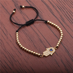 Hamsa Hand bracelet with gold beads, zircon evil eye, and adjustable black cord