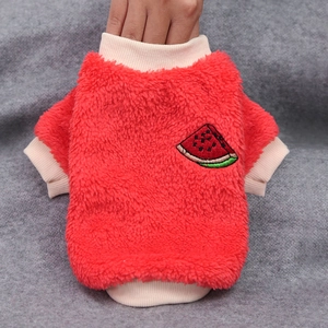 Detail of red pet fleece sweater showing stretchable ribbed neckline and watermelon patch