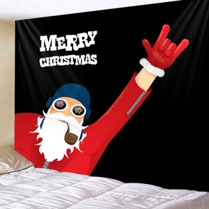 Detail view of rock-style Santa Claus Christmas tapestry hanging on a bedroom wall