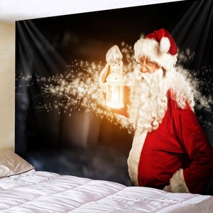 Detail of Christmas tapestry showing Santa Claus with a glowing lantern on a bedroom wall