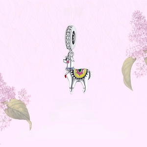 Detailed close-up of S925 sterling silver alpaca charm with colorful enamel and cubic zirconia