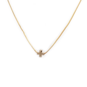 Polished gold cross pendant necklace with fine box chain shown on a clean white background