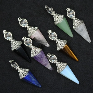 Detailed view of assorted natural stone cone pendants with decorative silver caps