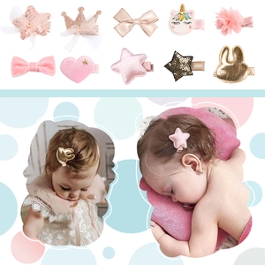 10-piece pink and gold girls' hair clip set with stars, crowns, and rabbits for babies