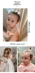 Three-way view of a girl wearing a pink silk bow and unicorn clips from a 40-piece hair set