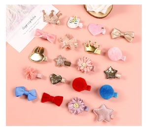 Detail of 40pcs girls hair clips set featuring PU leather bunnies, crowns and glitter bows