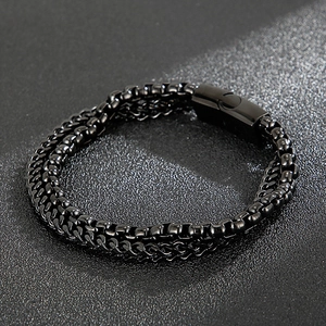 Detail of black double-layered stainless steel box chain bracelet with magnetic buckle