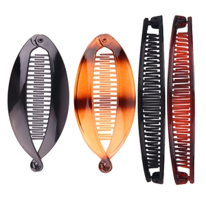 Set of four stylish banana hair clips in black and tortoiseshell colors for women