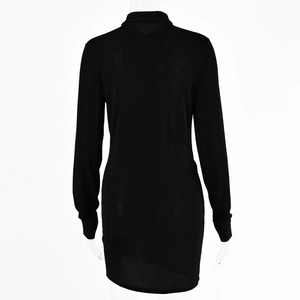 Rear view of black ribbed knit long sleeve dress showing slim fit and turn-down collar