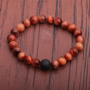 Mens beaded stretch bracelet with red tiger eye stones and a black lava rock accent