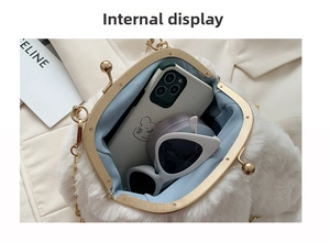 Internal view of plush rabbit ear bag showing space for phone and sunglasses