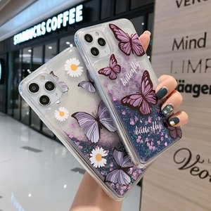 Detail of glitter liquid quicksand phone cases with butterfly and daisy patterns for iPhone
