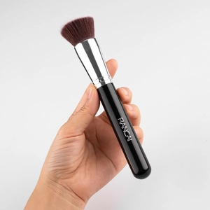 Detailed macro view of a flat top BB cream foundation brush with high quality synthetic bristles