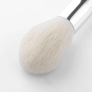 Large flame shaped highlighter makeup brush with soft cream white synthetic bristles