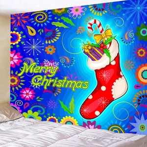 Detail of Christmas wall tapestry featuring a festive stocking and Merry Christmas typography