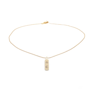 Gold necklace with rectangular pendant featuring micro-set zircon stars and moon motifs