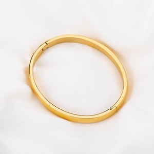 Minimalist 6mm 18K gold plated stainless steel oval hinge bangle with a mirror finish