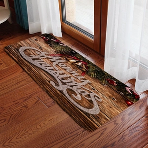 Detail view of the Christmas door mat with Merry Christmas text and festive decorations