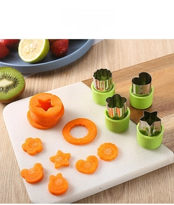 Detail of SUS304 stainless steel cutters shaping carrots into star and heart shapes