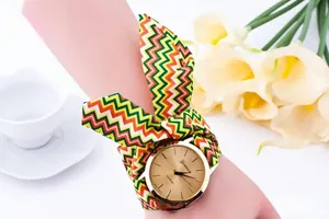Detail of Geneva women's watch with colorful zigzag fabric ribbon strap tied in a bow