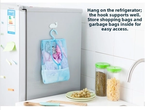 Detail of light blue mesh storage bag hanging on hook for organizing kitchen plastic bags
