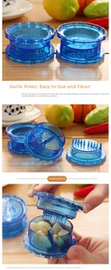 Manual blue plastic garlic mincer with internal teeth and twist design for easy crushing