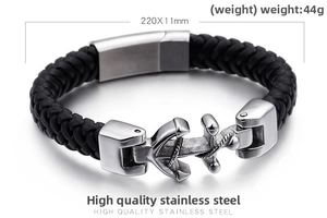 Detail of black woven leather cord bracelet with silver stainless steel anchor clasp