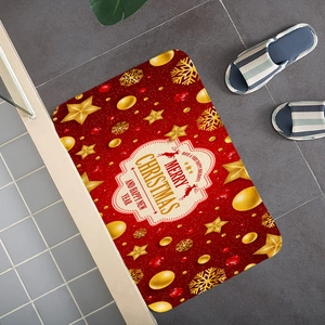 Detailed top view of a red and gold Christmas mat with Merry Christmas greeting text