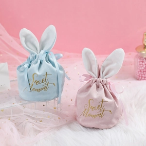 European velvet drawstring candy bags with rabbit ears and Sweet Moment gold lettering