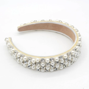 Baroque padded headband with white pearls and sparkling rhinestones on a satin base