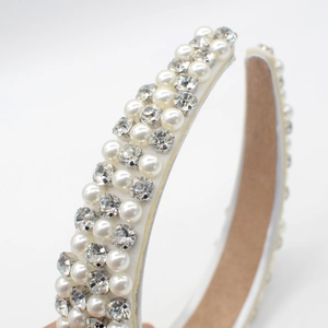 Macro detail of baroque headband with pearls, rhinestones and anti-slip lining