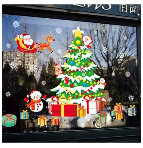 Christmas tree window stickers with Santa, snowman and snowflakes for festive decoration