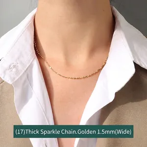 Close-up of a 1.5mm wide 18K gold-plated stainless steel star chain necklace on a model