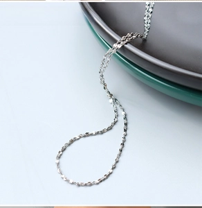 Close-up of 1.5mm stainless steel gypsophila chain necklace with a shimmering texture