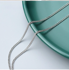 Macro detail of 1.8mm steel color faceted chain in high-quality polished stainless steel