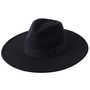 Close-up of black wool felt fedora hat featuring a 9cm wide brim and grosgrain ribbon