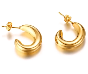 Detailed view of 18k gold plated stainless steel C-shaped hoop earrings on white background