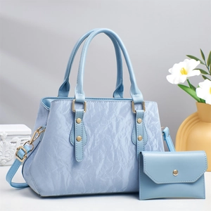 Light blue large capacity tote bag and small purse set in soft leather with gold hardware