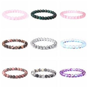 Grid view of various 8mm natural stone beaded bracelets showing diverse colors and textures