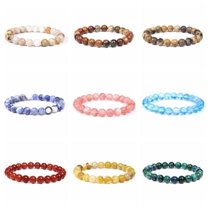 Collection of nine natural 8mm stone bead elastic bracelets in various mineral colors