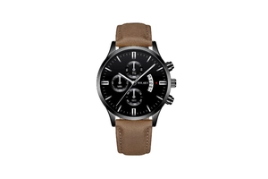 Detail of chronometer dials and calendar window on a black men's watch face