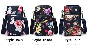 Detailed view of mini crossbody phone bags in three floral prints with silver hardware