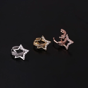 Star-shaped cartilage earrings in silver, gold, and rose gold with zircon stones