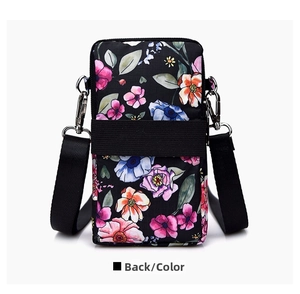Back view of floral mini crossbody bag showing elastic arm band and waterproof nylon fabric