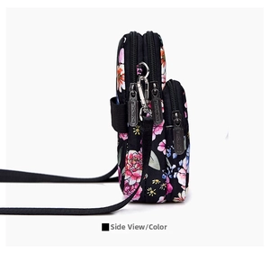 Side view of multi-layer floral mini crossbody bag with waterproof nylon and zipper detail