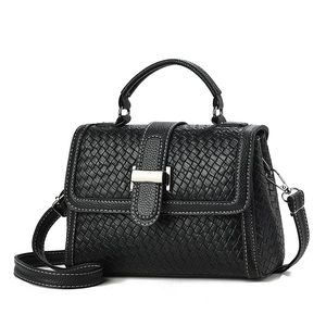 Elegant black woven texture handbag with silver metal buckle and adjustable crossbody strap
