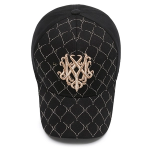 Classic black baseball cap with golden embroidery and elegant monogram lattice pattern